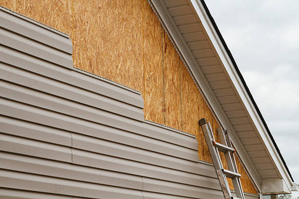 Professional Emergency Siding Repair technician working in Bristol, FL